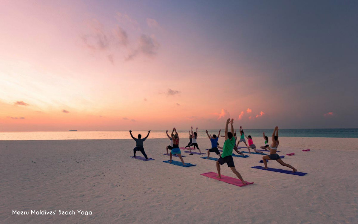 Beach yoga @ Meeru Maldives